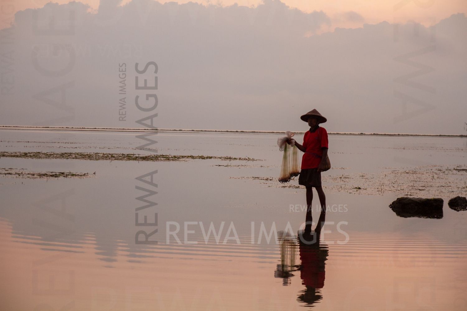 Fisherman at the sunrise
