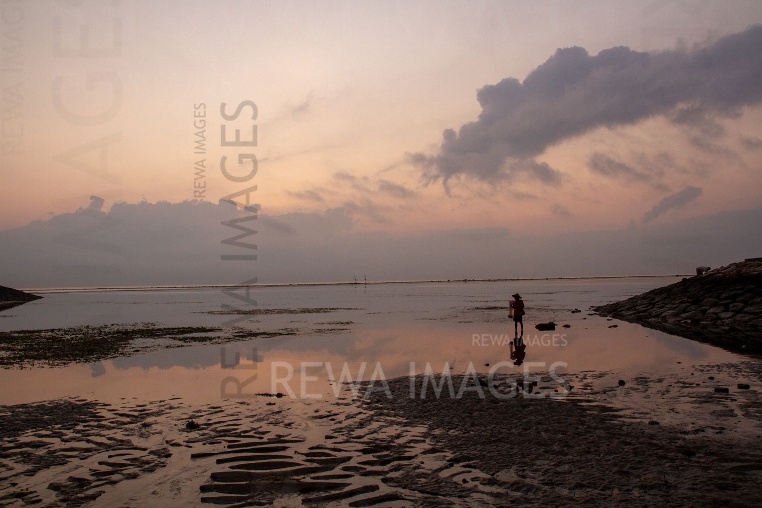 Fisherman at the sunrise