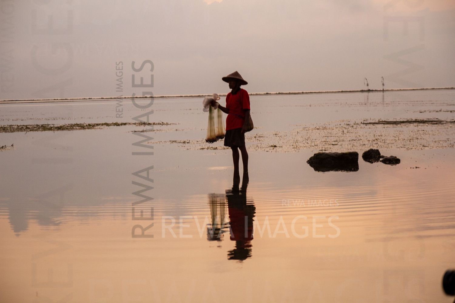 Fisherman at the sunrise